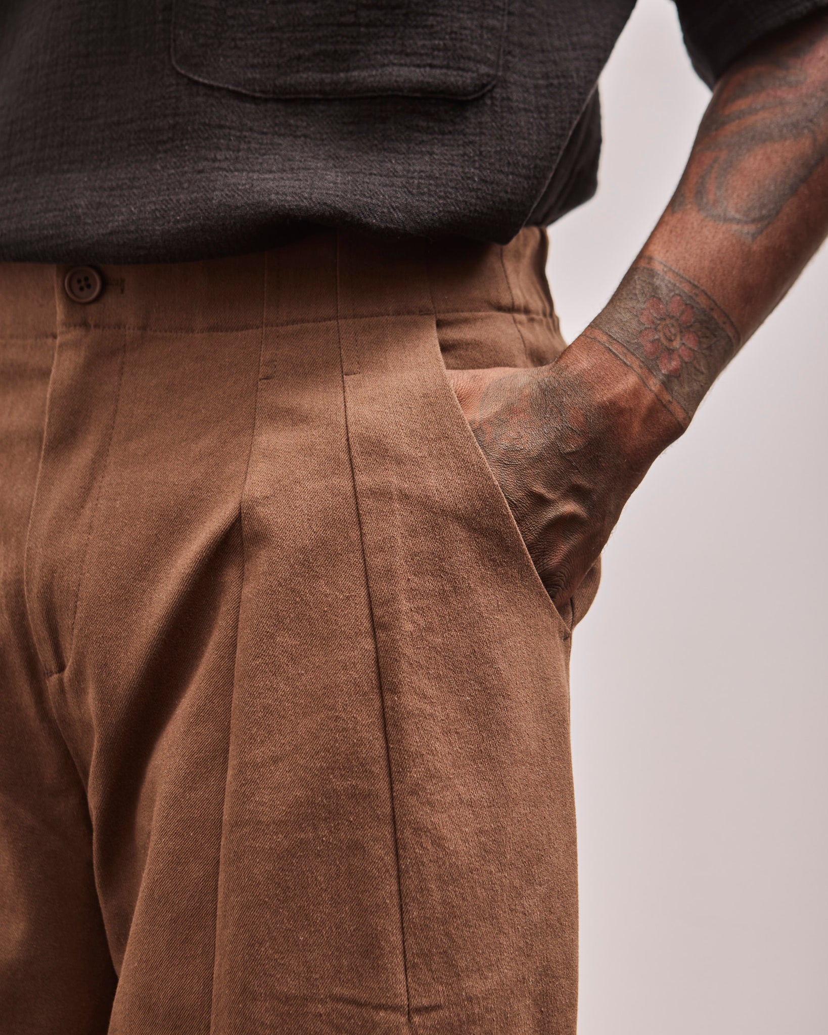 front pocket and pleat detail