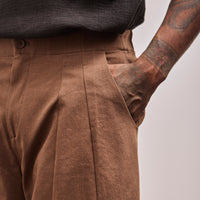 front pocket and pleat detail