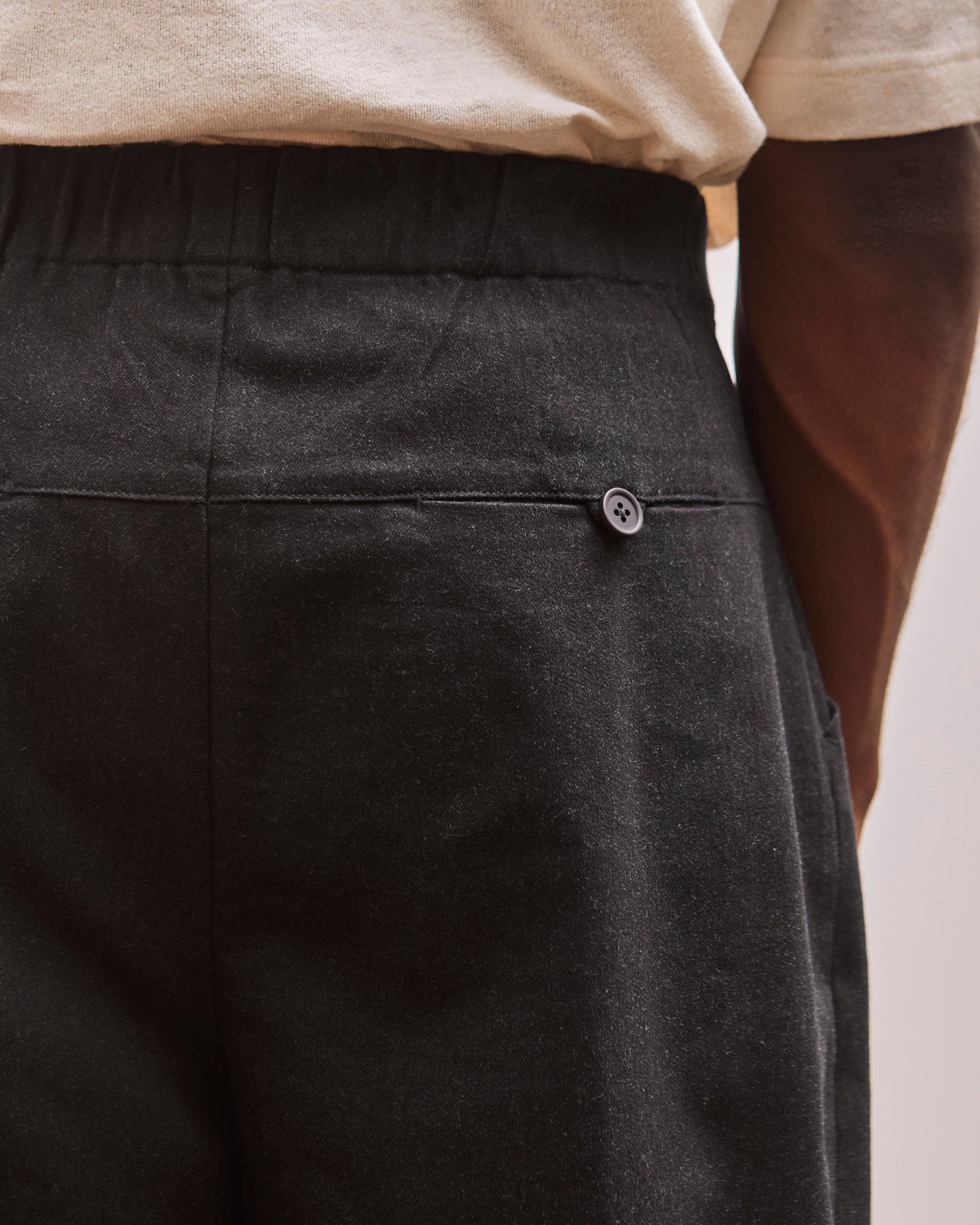 7115 Signature Pleated Trouser, Navy Black, back pocket detail
