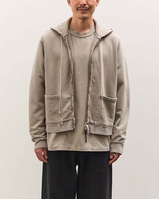 Man wearing a beige jacket with a white background