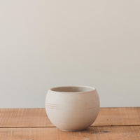 Astrid Pots, Tan