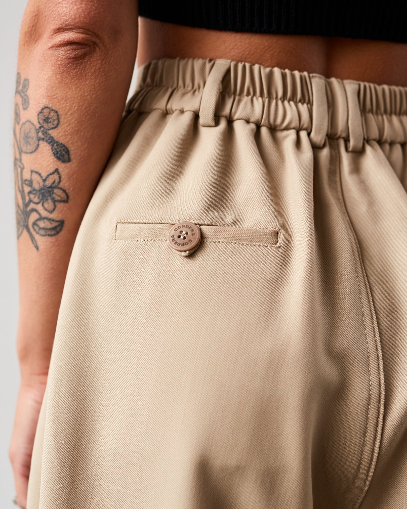 Cordera Tailoring Pareo Pants - Beige on Garmentory  Long knit tops,  Sustainable fashion brands, Cotton tops