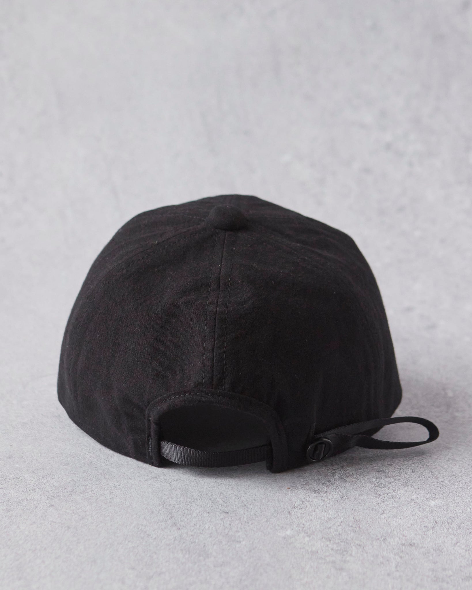 MAN-TLE R0C1 Unisex Hat, Black Wax
